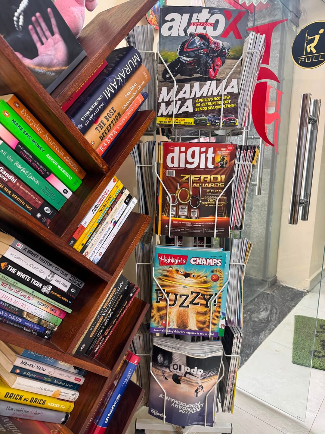 Magazine and book corner at The Jawed Habib, Reva Circle