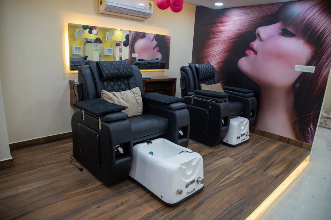 Massage chairs at the hair-wash and mani-pedi stations, The Jawed Habib, Reva Circle