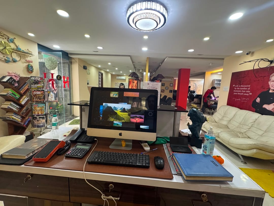 Wide view of the 2,000+ sqft salon floor at The Jawed Habib, Reva Circle